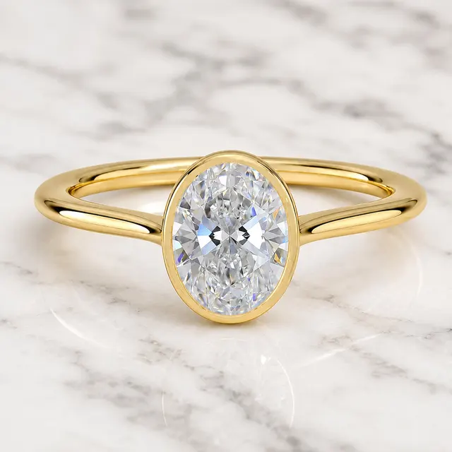 Oval Lab Grown Diamond Engagement Ring Bezel Solitaire 14K Yellow Gold E Color, IGI Certified